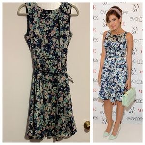 Belted floral Eva Mendes dress.